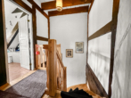 Flur im Dachgeschoss - Reetgedecktes Reihenmittelhaus in idyllischer Lage von 23936 Blüssen