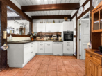offene Küche - Reetgedecktes Reihenmittelhaus in idyllischer Lage von 23936 Blüssen