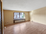 Wohnzimmer im Erdgeschoss - Gepflegtes Einfamilienhaus mit 103 m² Wohnfläche, Vollkeller und energieeffizienter Gasheizung (Bj. 2017)