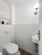 Gäste-WC im Erdgeschoss - RESERVIERT! Attraktives Reihenhaus in Lübeck – modernisiert und vermietet, mit Garten in Uni-Nähe