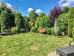 Gartenbereich - Stilvolles Wohnen in Travemünde – Außergewöhnliches KfW- Effizienzhaus mit mediterranem Charme