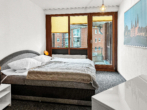 Schlafzimmer - Möblierte Wohnung mit Balkon & Pool in gefragter Lage von Travemünde